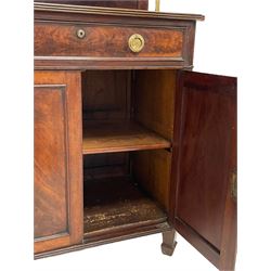 In the manor of George Bullock - early 19th century mahogany chiffonier writing desk, raised back with shelf on brass pillar supports, moulded rectangular top with concaved corners, single frieze drawer with moulded edge, fitted with sliding and hinged leather inset writing surface and small lidded compartments, the lock stamped 'GR J. Bramah's Patent, Shaw & Crane', with circular brass handle plates engraved with trailing bellflowers, double cupboard enclosed by figured panelled doors, concaved uprights to match the top, on square spade feet, 
