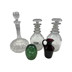 A near pair of 19th century decanters, another decanter, glass jug and a Victorian glass dump