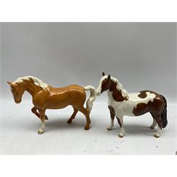 Pair of Beswick model horses, Palomino first version, Pinto pony second version, Fox 1016, Greyhound 'Jovial Roger', Kookaburra 1159, together with three Koalas (9)