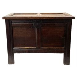 18th century oak coffer, double panelled front and lid, the interior fitted with small candle box, moulded frame and stile supports