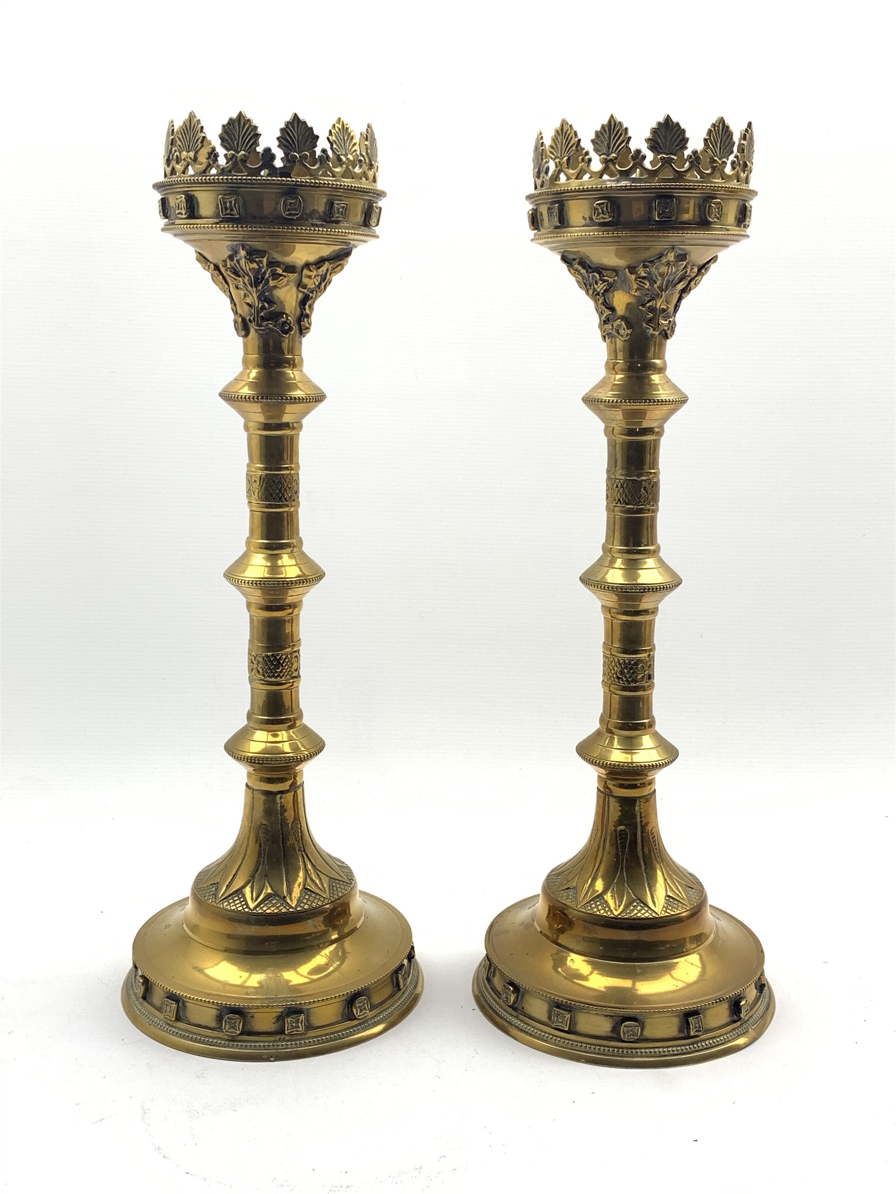 DS Pair of large Gothic style brass pricket candlesticks, H50c
