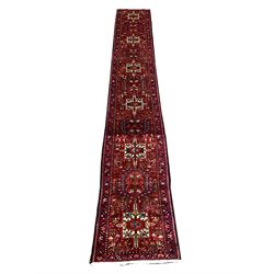 Persian Karajeh runner rug, red ground decorated with geometric design 