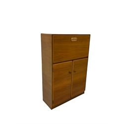 Teak chest with one fall front drawer over two cupboards, raised on a plinth base
