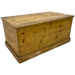 19th century scumbled pine blanket chest, rectangular hinged top, the interior fitted with three small drawers, lower moulded edge over plinth base