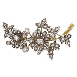 Early 20th century gold and silver white sapphire and paste stone set flower spray brooch