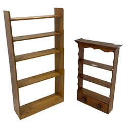 18th century pine wall hanging shelf, fitted with two drawers (W53cm, H86cm, D16cm); and a pine five-tier waterfall bookcase (W63cm, H123cm, D23cm)