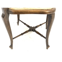 Late Victorian corner chair, the raised shaped back relief carved with shell and scrolls, three pierced splats, upholstered seat, on cabriole supports joined by turned x shaped stretchers