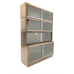  Early 20th century 'Simplex' oak stacking library bookcase with four shelves, each with sliding glass doors, W92cm, H131cm, D29cm   