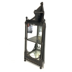 Victorian ebonised corner wall hanging shelf, with incised and gilt painted detail, turned pilasters, mirrored back and ball finials, 