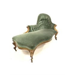 Victorian walnut framed serpentine chaise longue, upholstered in buttoned green velvet, with scrolled arm terminals and supports terminating in brass castors, L180cm