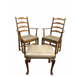 Pair of Ercol ladder back carver chairs with upholstered squab cushions, (W62cm) together with a mahogany framed footstool, the top upholstered in studded leather, raised on cabriole supports (W52cm)