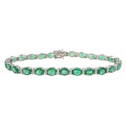 18ct white gold oval cut emerald and round brilliant cut diamond bracelet, stamped 750, total emerald weight 8.30 carat