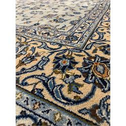 Fine hand knotted Persian Kashan carpet, floral medallion on grey field enclosed by border  244cm x 374cm
