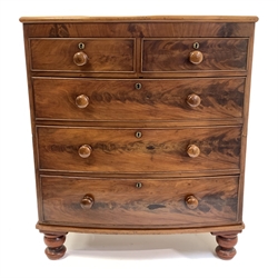 Victorian mahogany bow fronted chest fitted with two short and three long graduated drawers, raised on turned supports,  W94cm, H110cm, D52cm
