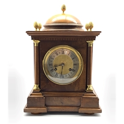 Late 19th century walnut cased bracket clock, dome top with five gilt metal finials, dentil work under, the silvered dial with Roman and Arabic chapter ring enclosed by gilt metal leaf capped turned pilasters, eight day twin train movement striking hammer on coil, W27cm