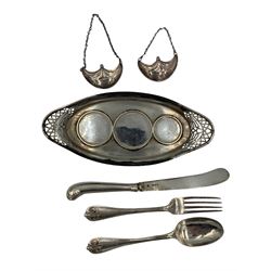 Early 20th century pierced silver condiment stand by Haseler Brothers, Chester 1918, Victorian silver Christening spoon, fork and knife set by William Gibson & John Lawrence Langman, London 1891 and a pair of Georgian style Claret labels, weighable silver 6.6 ozt
