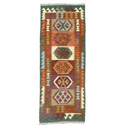 Anatolian Turkish Kilim runner rug in forest tones, the field with six hexagonal lozenges, surrounded by a double-band border with repeating geometric patterns