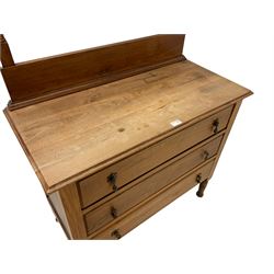 Edwardian walnut dressing chest, fitted with oval swing mirror with bevelled plate, rectangular top over panelled sides, fitted wit three drawers