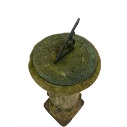 Antique cast sundial with Roman numerals, raised on fluted column pedestal in the Doric style
