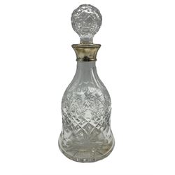 Glass decanter with wide foot featuring silver collar by Mappin and Webb, Birmingham, dated 2000