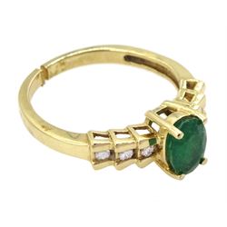 14ct gold single stone oval emerald ring, with stepped design diamond set shoulders, stamped