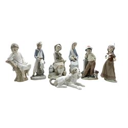 Six Lladro figures including American Love (boxed) 6153, Best Foot Forward 5738, Boy with yacht 4810, Girl with a Puppy, two others and a Nao dog
