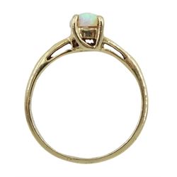 9ct gold single stone oval opal ring with cubic zirconia set shoulders, hallmarked 
