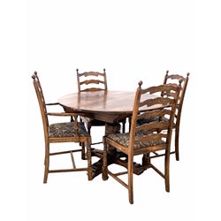 18th century style oak dining table, the circular top with one additional leaf housed under raised on a leaf carved baluster column and cruciform base (D116cm, H76cm) together with a set of four (2+2) oak ladder back dining chairs with drop in upholstered seat pads W58cm