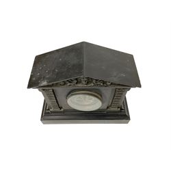 French - late 19th century Belgium slate 8-day mantle clock with an architectural pediment and Tympanum, columns with Corinthian capitals to the front on a broad rectangular plinth, dial with a gilt centre and slate chapter with incised gilt Roman numerals and visible Brocot escapement, rack striking movement striking the hours and half hours on a coiled gong. No pendulum.
 