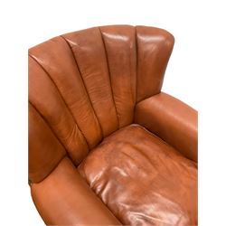 Club armchair upholstered in tan leather, barrel back and rolled arms, with stud work detail, on splayed feet