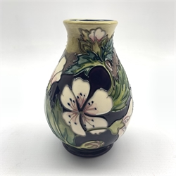  Moorcroft Mallow pattern vase designed by Phillip Gibson for the Herb Collection, H14cm   