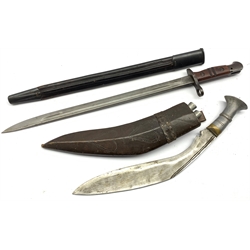World War I Remington P 17 bayonet, the blade marked U.S. 1918, the scabbard inscribed 'G.G. Bussey & Co 1916 blade length 43cm and a Kukhri with skinning knives in leather scabbard