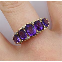 9ct gold five stone oval amethyst and diamond chip ring, hallmarked