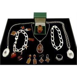 Silver Baltic amber jewellery including ring pendant/charms, pendant necklace and earrings, two silver curb link bracelets, two stone set silver lockets and a silver  cubic zirconia ring