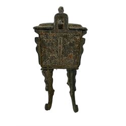 Chinese archaistic style censer of fang ding form, the rectangular sectioned vessel supported by four flattened kui-form legs, the sides cast in relief with taotie, pierced rectangular cover surmounted with a recumbent mythical creature, H20cm