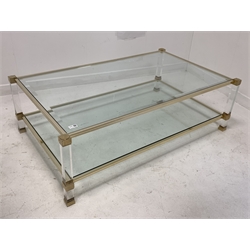 Pierre Vandel of Paris - Large mid century Hollywood Regency Lucite, brass and crystal glass coffee table, the bevelled inset glass top raised on square supports united by under tier 
