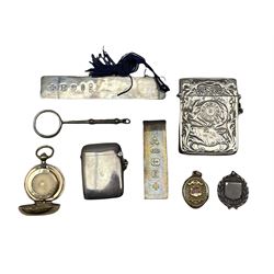 American sterling silver vesta case for the fraternal Elks Lodge order, plain silver vesta case, two silver note clips, gilt sovereign case, silver magnifying glass, locket and a silver fob