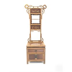 20th century Chinese hardwood hall stand, the raised back with applied scroll carved decoration and marquetry inlay, the bottom section fitted with one drawer and a cupboard, raised on stile supports W55cm, H178cm, D45cm