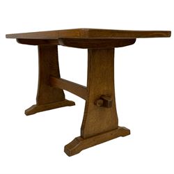Possibly Beaverman - oak side table, rectangular top on shaped end supports with sledge feet joined by a pegged stretcher, unsigned 