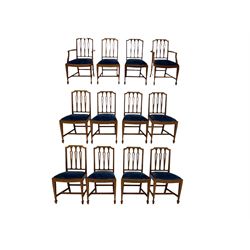 Set twelve (10+2) 20th century mahogany dining chairs with drop in seat pad, raised on peg feet 