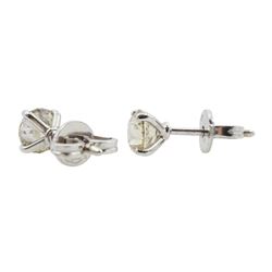 Pair of 18ct white gold round brilliant cut diamond stud earrings, stamped 750, total diamond weight approx 1.10 carat