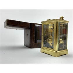  Late 19th century four glass brass carriage clock, white enamel dial with Roman numeral chapter ring, eight day striking movement, in leather travelling case, H16cm  
