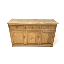 20th century elm sideboard, three drawers above three cupboards