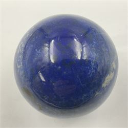 Lapis lazuli sphere, upon a carved stone stand, D7cm