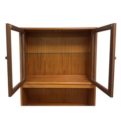 G-Plan - mid-20th century teak cabinet, glazed cupboard over shelves and three drawers