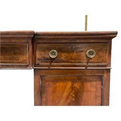 George III mahogany break-front sideboard, the figured top with raised brass rail and inlaid satinwood band over three drawers, on twin pedestal base each fitted with cupboard, raised on moulded plinth base