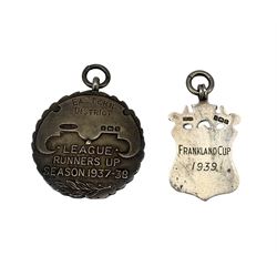 Two 1930s silver fobs comprising Taylor Walker Dart Competition, League Runners Up Season 1937 - 38 and a shield shaped fob inscribed 'Frankland Cup 1939' (2)