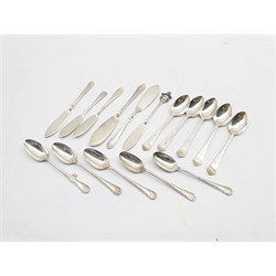 Five silver tea spoons with chased stems Sheffield 1915, four engraved silver tea spoons and six various silver butter knives 8.8oz