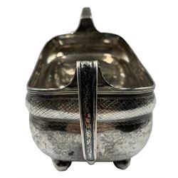 George III Irish silver 2 handled rectangular sugar bowl with monogram and engraved decoration on ball feet, marks rubbed but appears to be Dublin 1810 