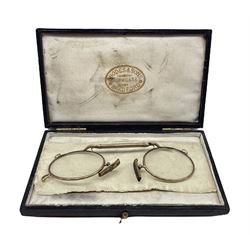 Pair of gold pince-nez, marked 375, housed in a Rhodes & Sons Kirkgate Bradford case